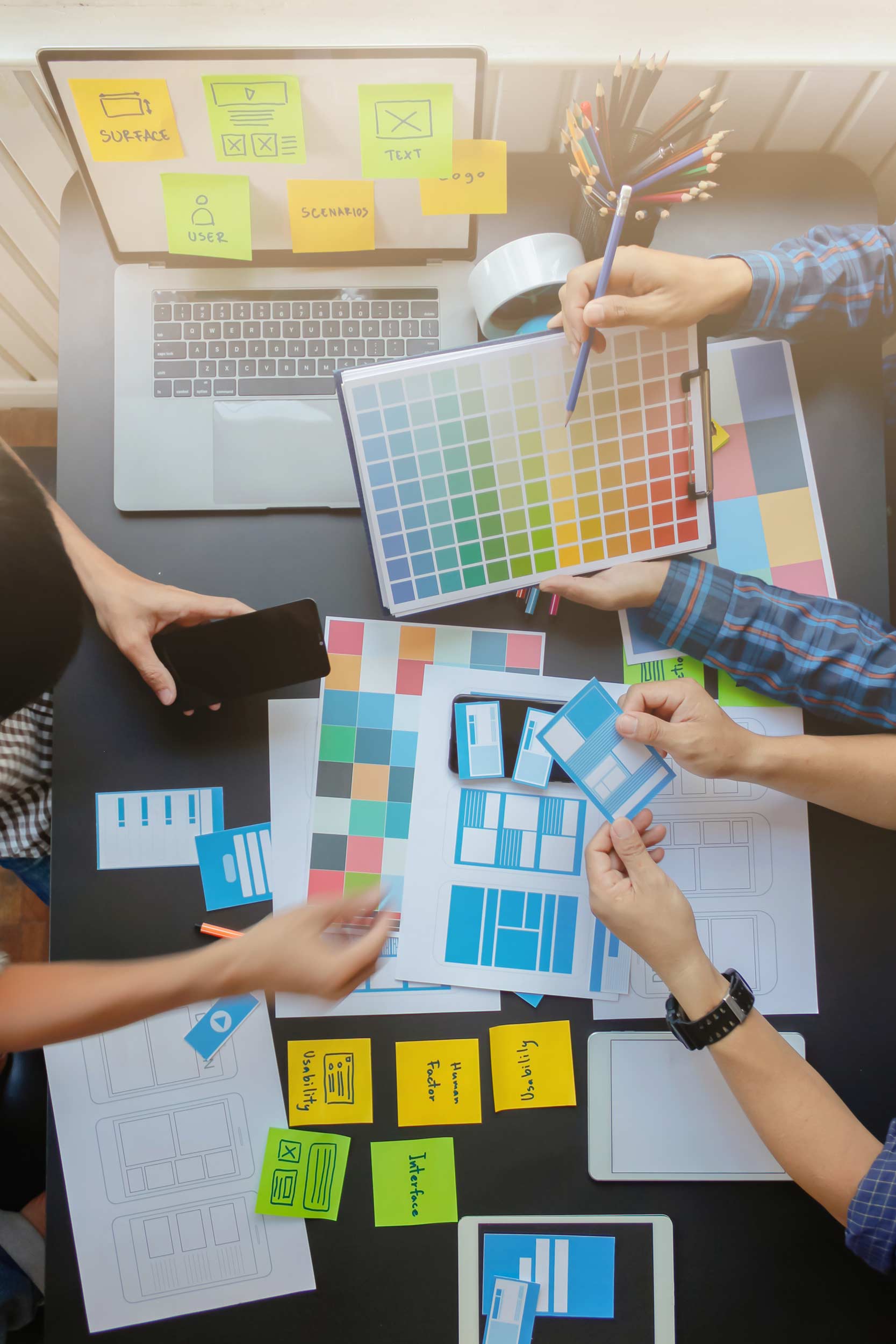 A group of Website Designers at a digital marketing agency brainstorming web design template in Hampshire