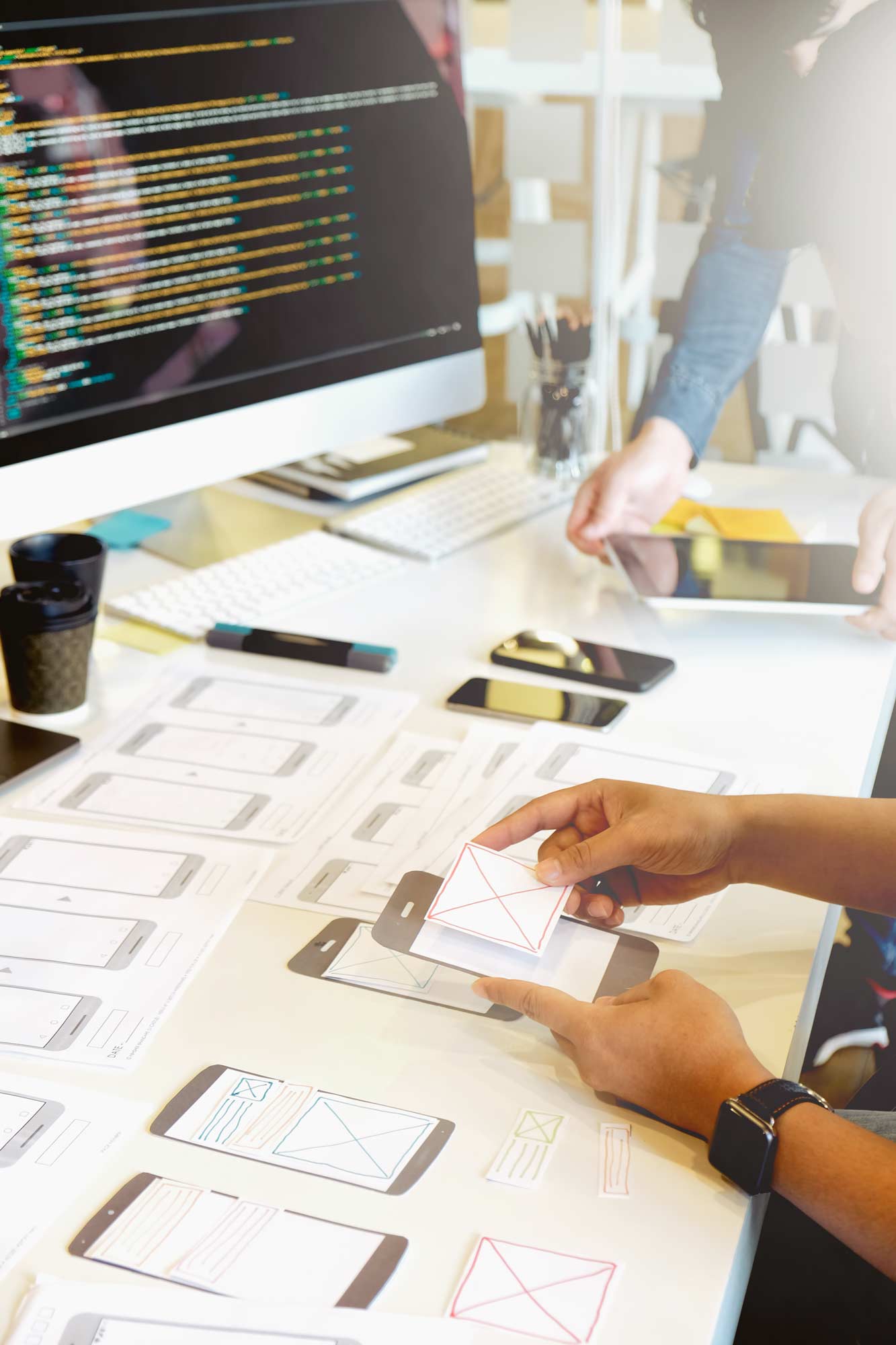 A team of web developer working together on the UX of the website